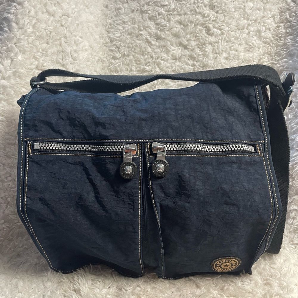 Kipling Nylon Expandable Navy Blue Large Messenger Bag  Key Clip. Black strap .